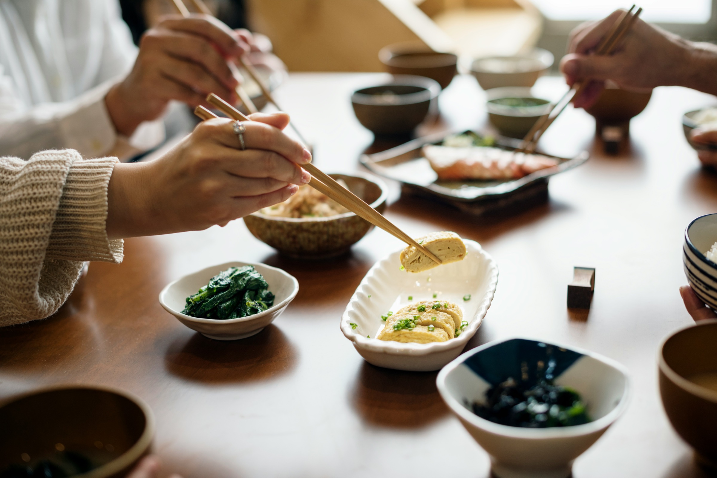Friends sharing an everyday meal at a table